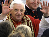 Pope Benedict XVI waves upon his arrival to the cathedral in Freising, southern Germany. (AP / Alessandra Tarantino)